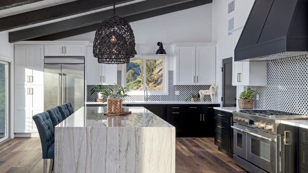High-end kitchen with white cabinetry and marble island